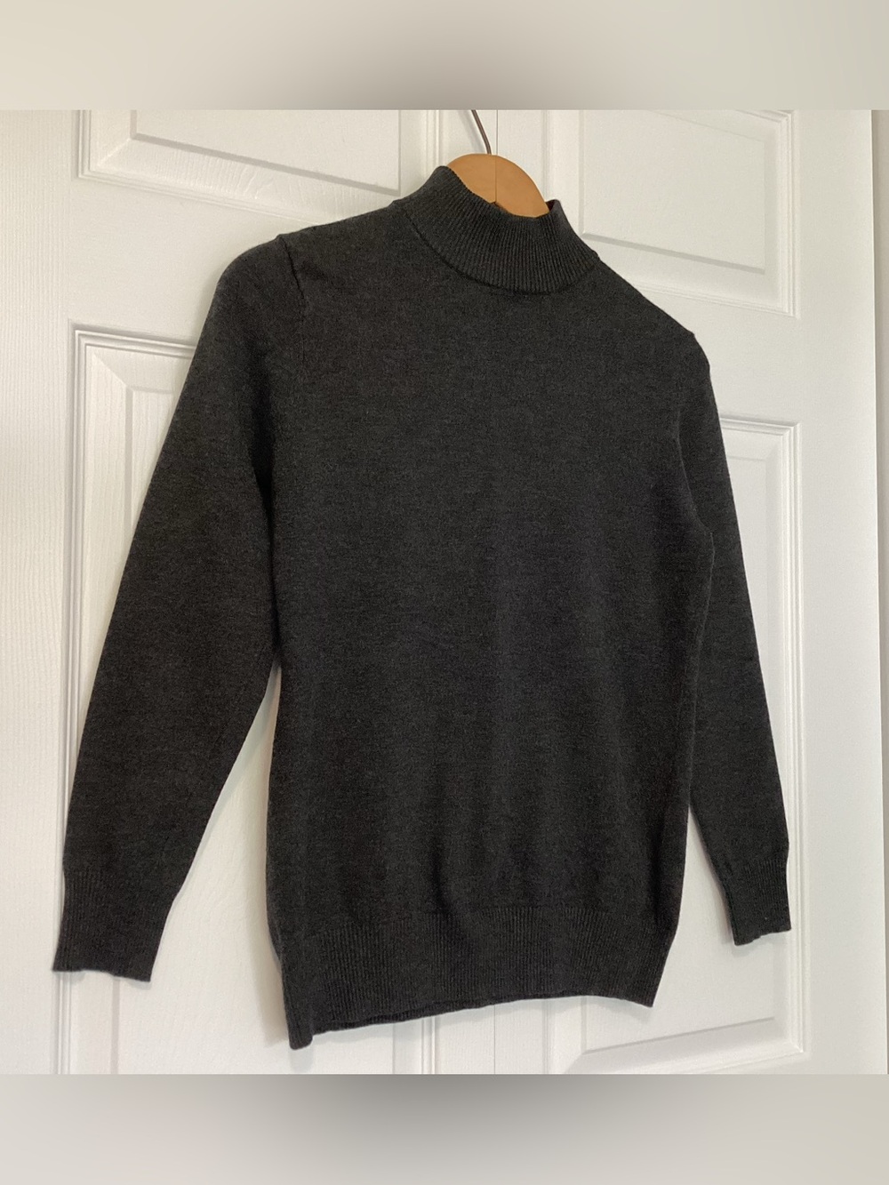 Sweater, dark grey mock neck in size M.